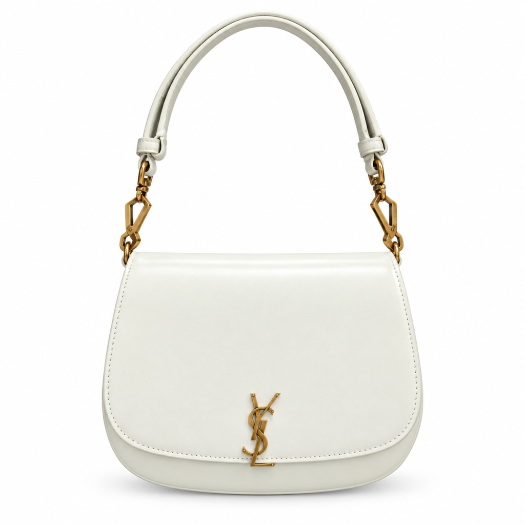 Saint Laurent YSL Voltaire structured saddle flap shoulder bag in white smooth calfskin leather with geometric antique gold hardware and YSL monogram
